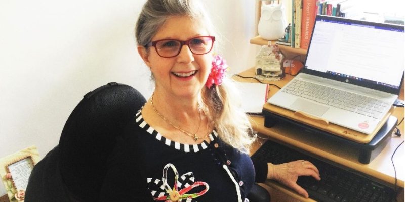 Lois Davis at her desk